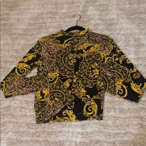 NWOT gold chain and cheetah print mock neck shirt